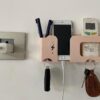 GEOCARTER Wall Mobile Holder, Multi-Purpose Phone Charging Stand,Space Saving Remote, Keychain Holder & Pen-Pencil Organiser for Wall Mount, Portable Smart Gadget Mobile Accessories -Apricot, Pack-1